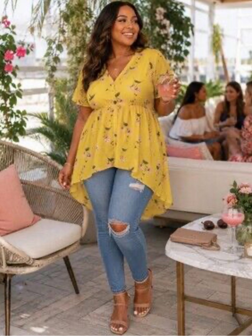 Torrid Lexie Babydoll tunic featuring a floral pattern and a high-low hem size 1